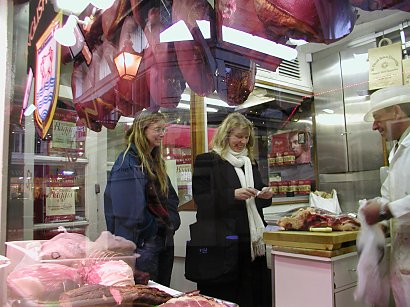 Sisters in a butcher shop in Oxford buying Vegetarian haggis