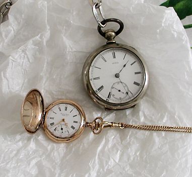 little gold watch c.1910 and big conductors watch c.1860