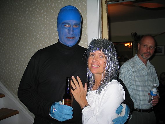 halloween costumes of blue man and glittery woman