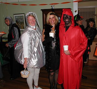 halloween costumes: hershey's kiss, flapper, red man
