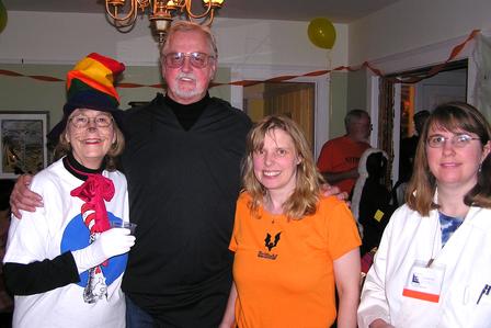 halloween party four people standing together