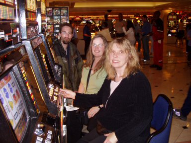 flamingo hotel slot machines with three gamblers