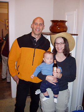 bald man, farm girl, and baby