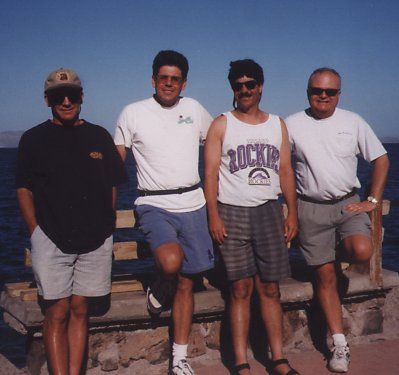 4 guys standing at the beach in Loreto, Baja