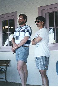 two dorks standing at the hotel trying to look cool